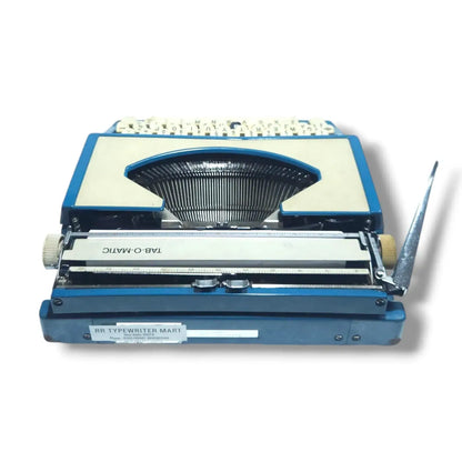 Rear view Imperial Tab-O-Matic imported typewriter with metal body and English typing keyboard