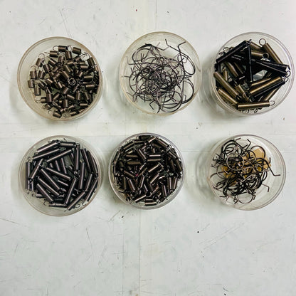 Collection of manual typewriter springs sorted by type for restoration, typewriter parts store RR Typewriter Mart