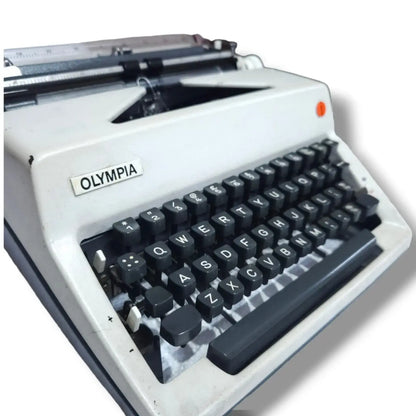 Vintage Olympia Portable manual typewriter for writers, collectors, and everyday typing