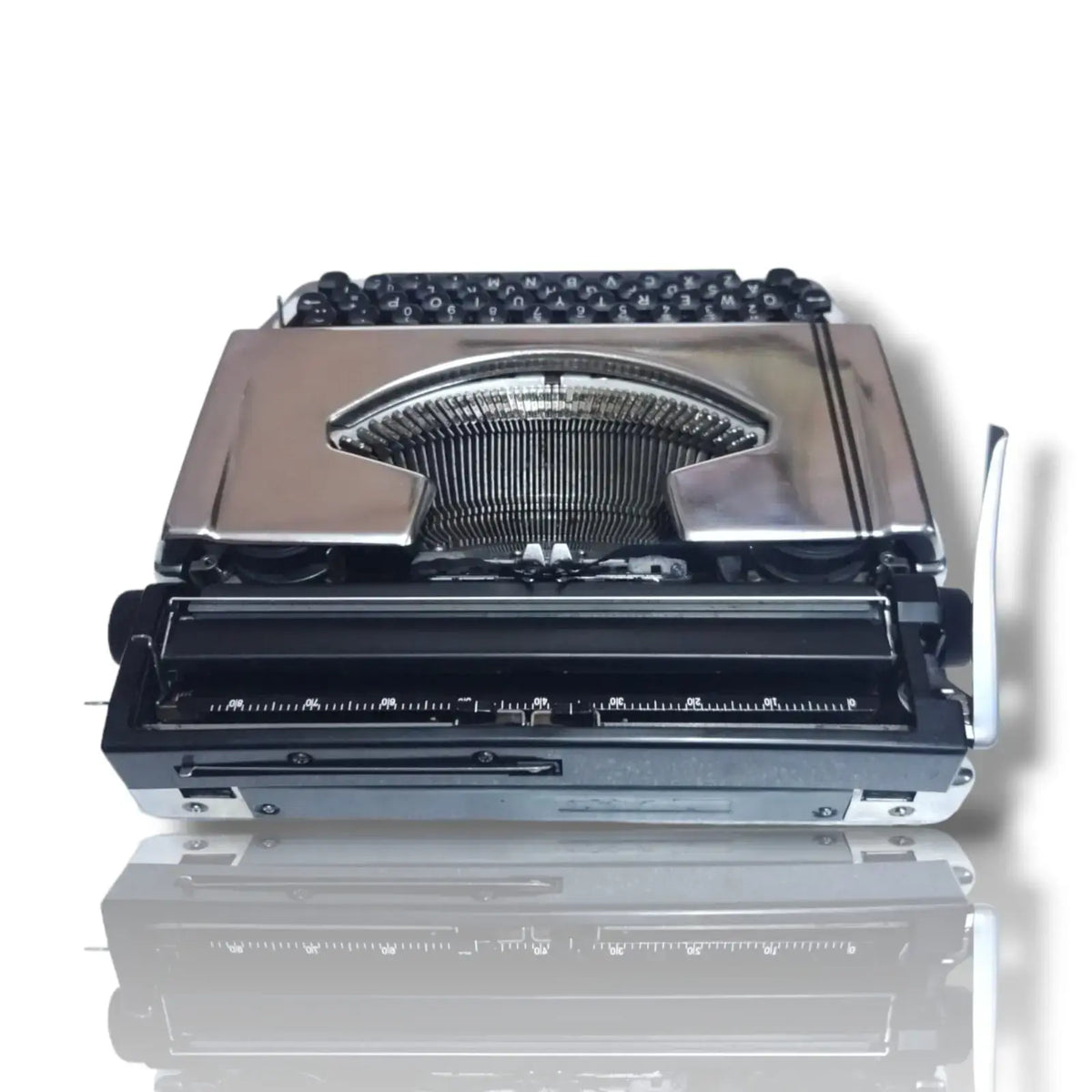 Rear view chrome Brother Deluxe 220 imported typing machine from RR Typewriter Mart store