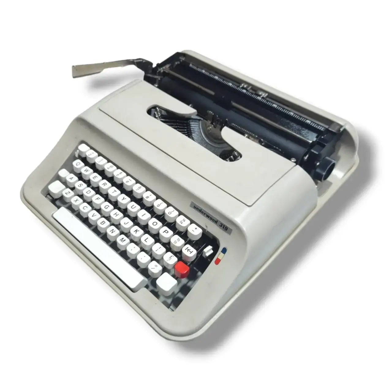 Underwood 319 portable typing machine for writers at RR Typewriter Mart typewriter seller