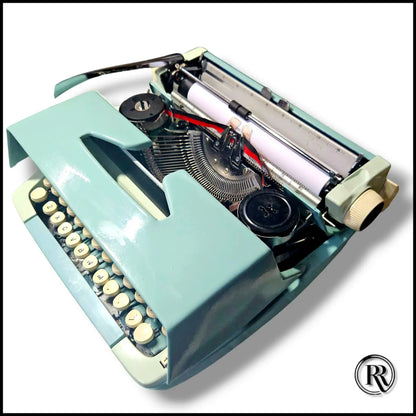 Vintage Smith Corona Typewriter in Hue Blue – ideal for writing projects and collectors, free delivery.