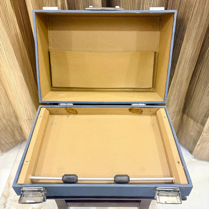 Open wooden case displaying the Perkins Brailler, its interior and machine at RR Typewriter Mart for Braille users across India today.