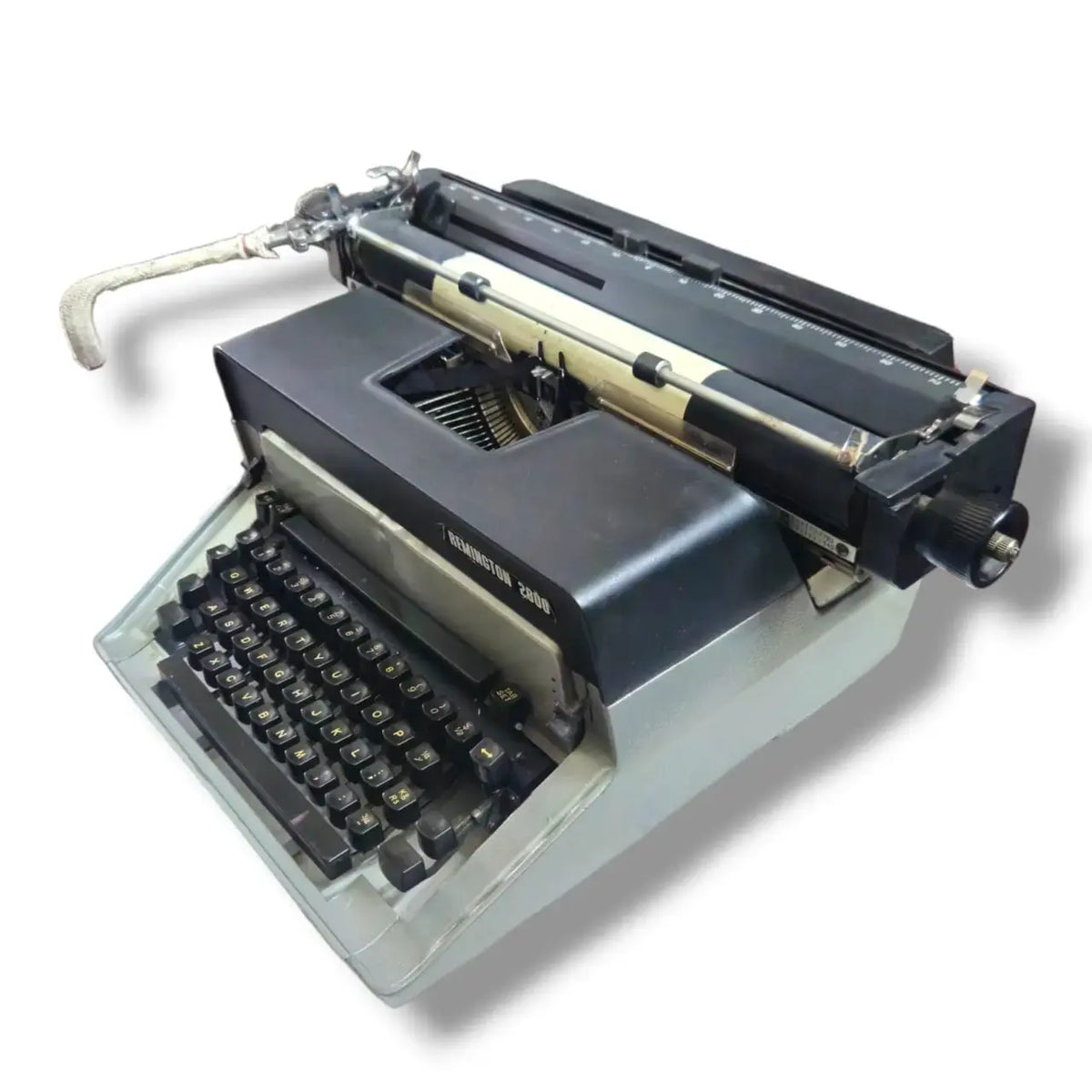Side view of Remington English typewriter showing carriage, reliable manual English typewriter with typewriter price