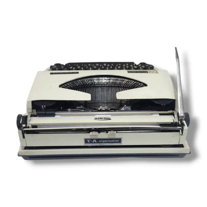 Adler Tippa Triumph typewriter rear view showing carriage, typebars, ribbon spools and Made in Holland label