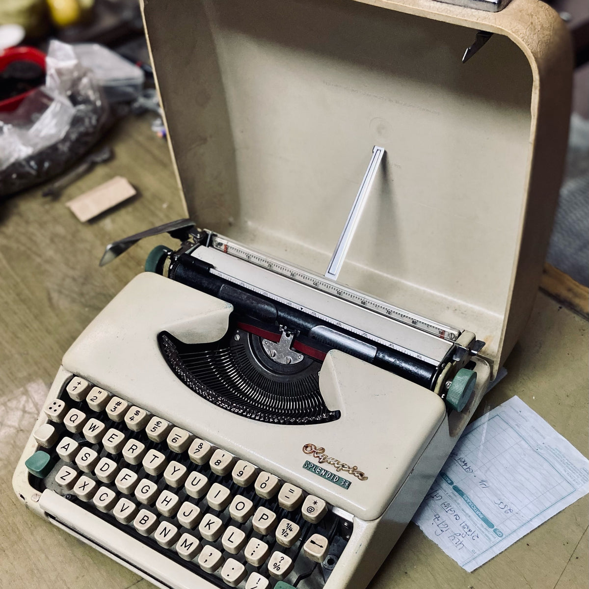 Olympia Splendid 33 portable typewriter with original case, vintage manual typing machine for writers and collectors
