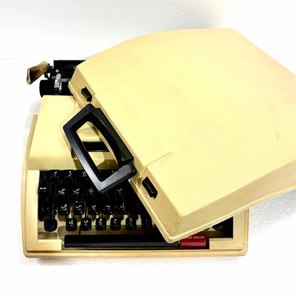 Brother 750TR Arabic keyboard typewriter with black keys, Arabic characters and cream body, professionally restored and ready to type