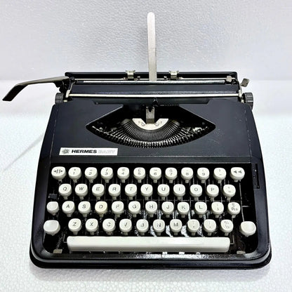 Black Shadow Hermes Baby typewriter with ivory keys, manual English typewriter, RR Typewriter Mart online India
