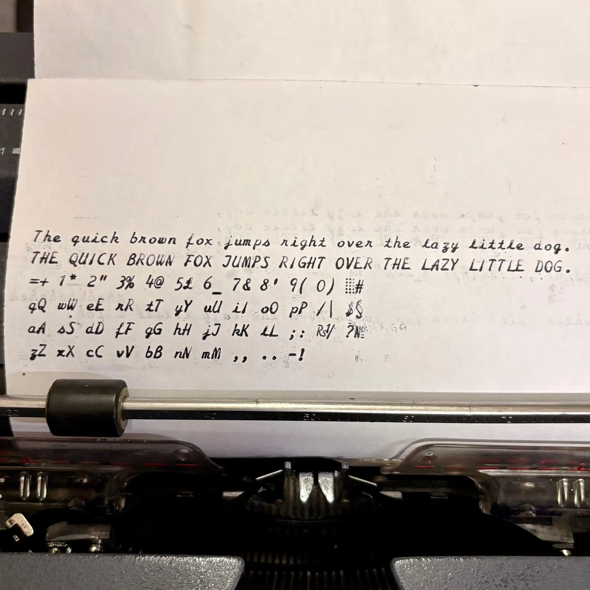 Typing on a restored Godrej English Typewriter from RR Typewriter Mart, creating crisp handwriting-style documents.