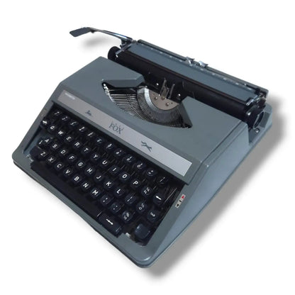 Grey Fox Japanese typewriter with compact portable body, imported typing machine at RR Typewriter Mart