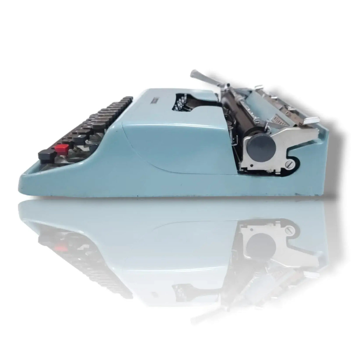 Side profile of blue Olivetti Lettera typewriter portable manual English typing machine for collectors