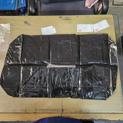 Fully unfolded black rexine dust cover for policy carriage typewriters during storage and maintenance