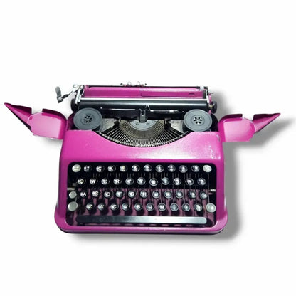 Open wing pink Hermes typing machine manual English typewriter at RR Typewriter Mart store