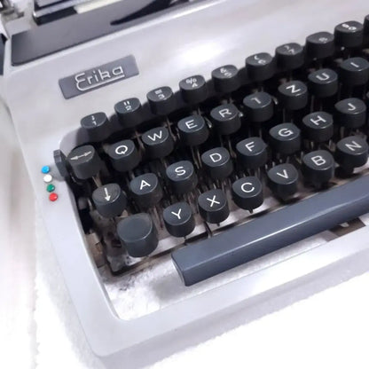 Classic Regal Erika portable writing machine with timeless vintage typewriter aesthetics