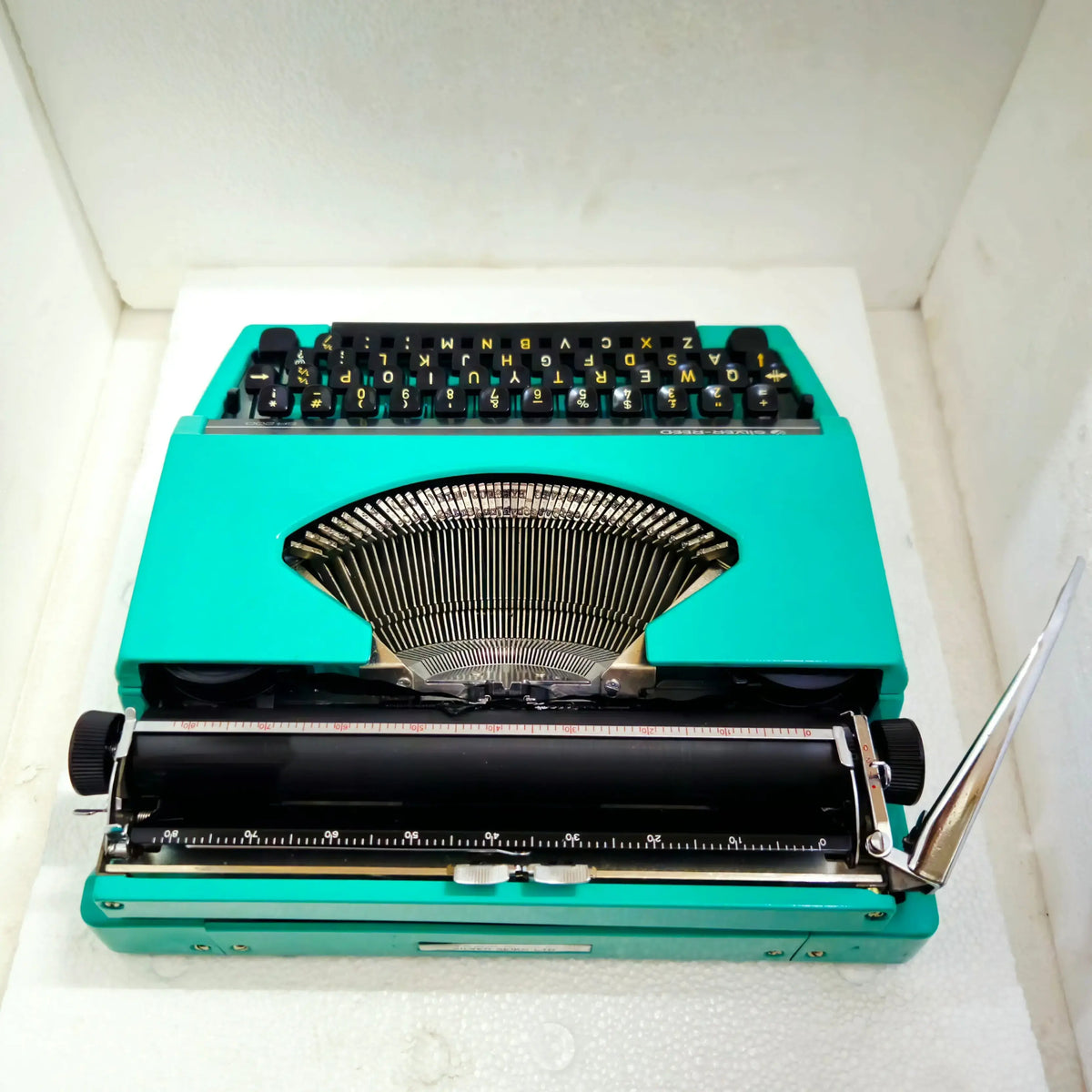 Silver Reed portable typewriter with carry case – typewriting machine online by RR Typewriter Mart
