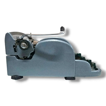 Left side profile of Remington Personal Writer portable typewriter, imported typewriter by RR Typewriter Mart