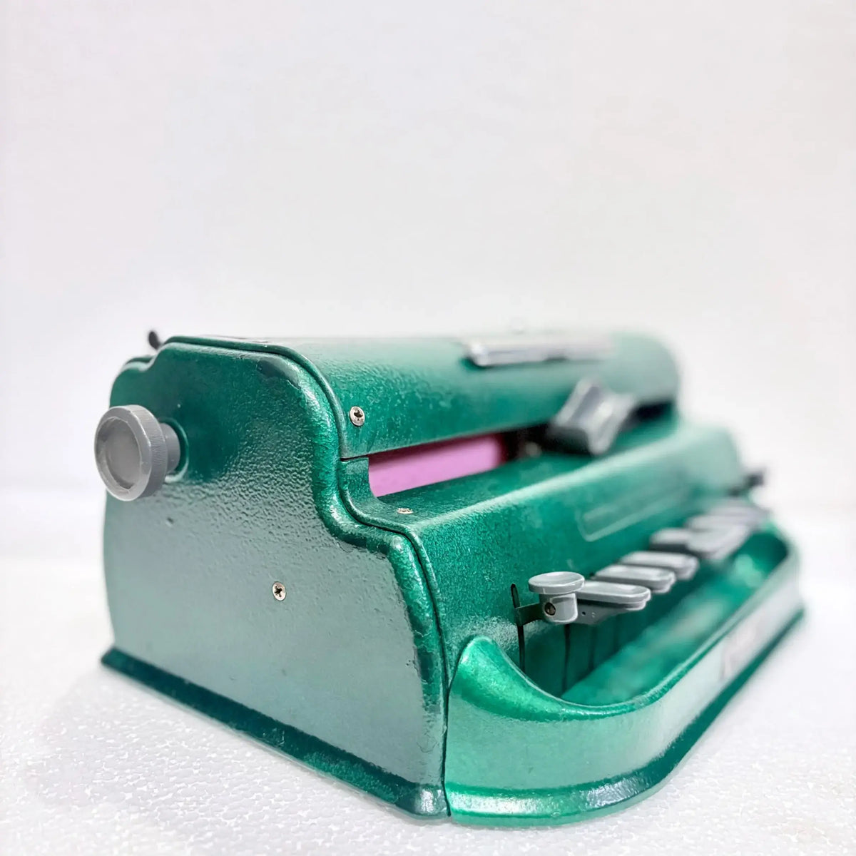 Side view of Emerald Green Perkins Braille Typewriter, Braille Typewriter Store offering quality machines
