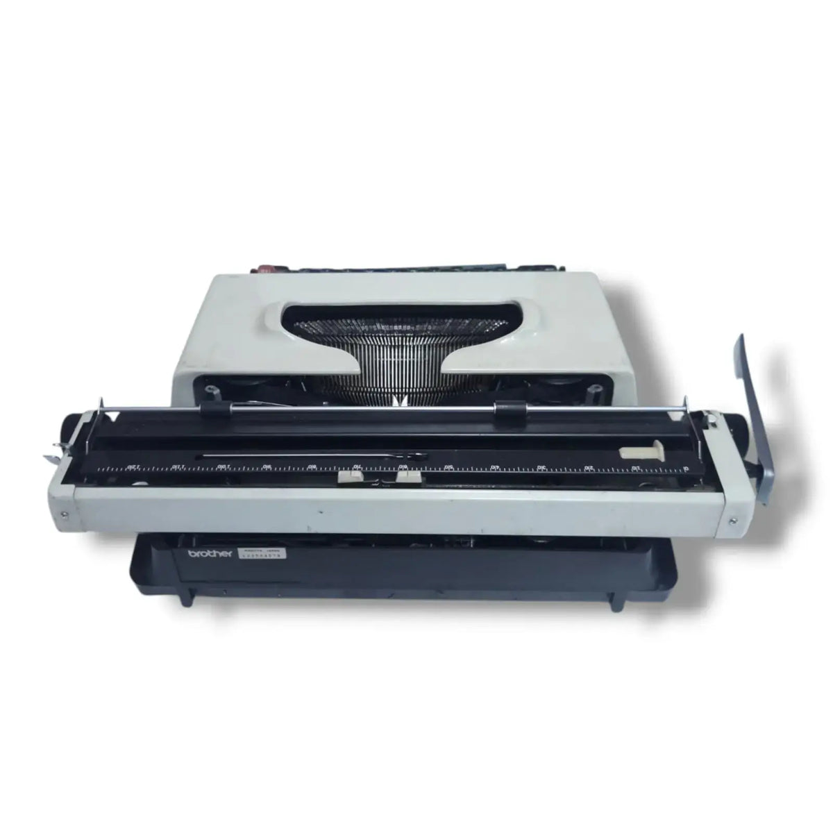 Rear view Brother Deluxe typewriter carriage and body, imported manual English typing machine