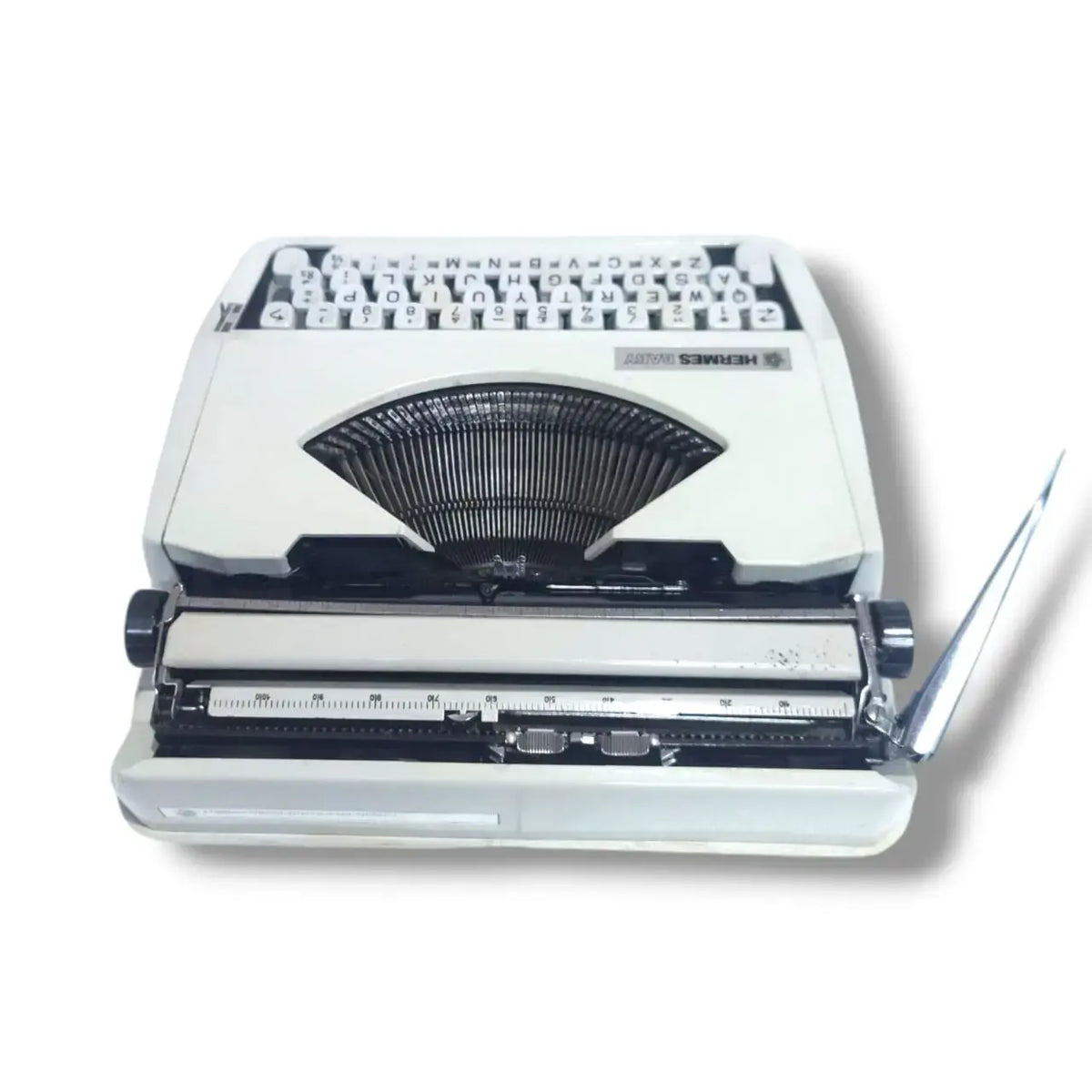 Rear view Hermes Baby typewriter with chrome carriage, manual English Typewriter for collectors and writers