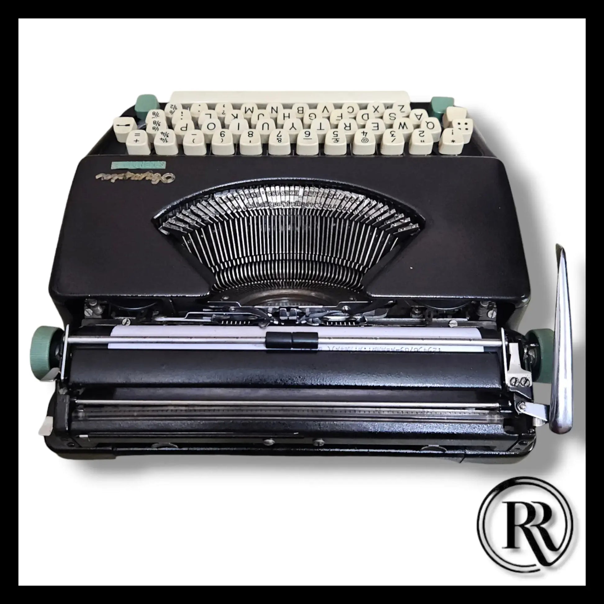 Rear view Olympia Splendid 33 portable typing machine, Buy Typewriter from expert Typewriter Seller
