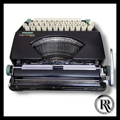 Rear view Olympia Splendid 33 portable typing machine, Buy Typewriter from expert Typewriter Seller