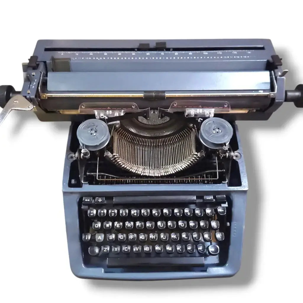 Top view of Godrej English typewriter with ribbon spools, typebars, fully working manual typewriter