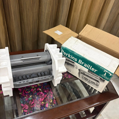 Factory-sealed Perkins Braille Typewriter with original box and foam packaging from Braille Typewriter Store