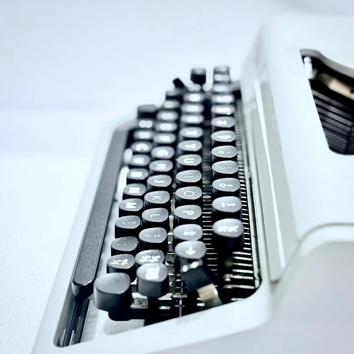 Close view of keys on Erika Typewriter, a portable manual typewriter available from RR Typewriter Mart
