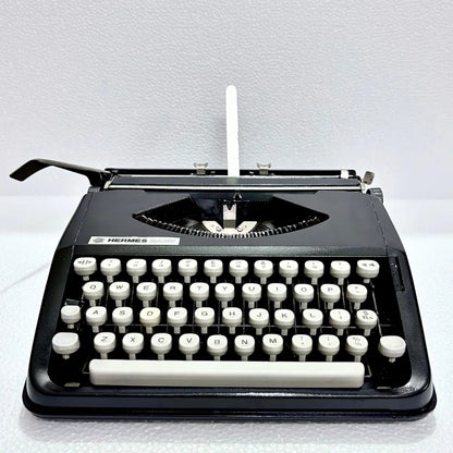 Hermes Baby Black Shadow vintage typewriter, compact portable typing machine, RR Typewriter Mart for collectors