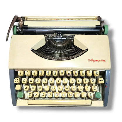 Front angle Olympia portable typewriter, imported typing machine from RR Typewriter Mart typewriter seller