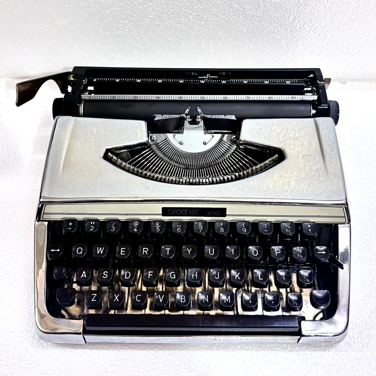 Brother 210 mirror chrome typing machine professionally restored by Indian typewriter seller for writers