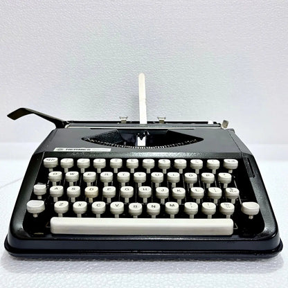 Hermes Baby Black Shadow manual typewriter front view, portable writing machine, RR Typewriter Mart from Delhi