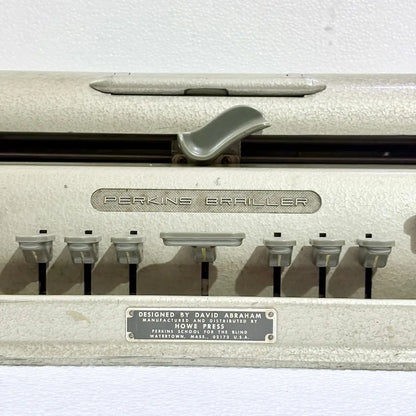 American Braille Typewriter featuring original gold-toned factory paint and sturdy metal construction, available from RR Typewriter Mart