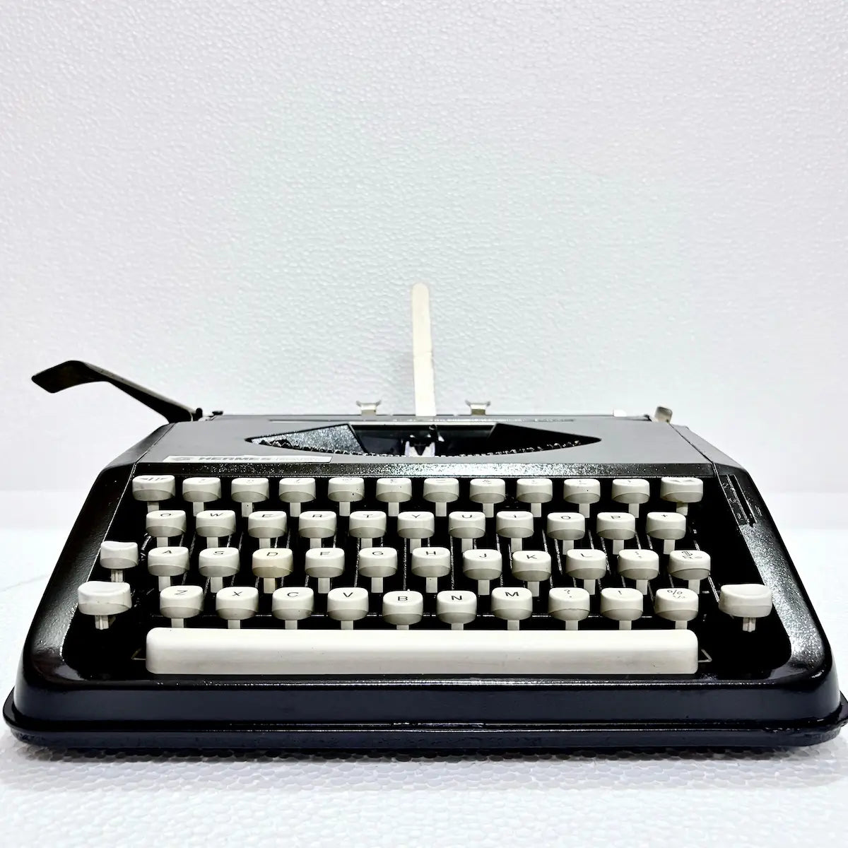Black Hermes Baby typewriter with classic QWERTY keyboard, manual typing machine, RR Typewriter Mart from Delhi
