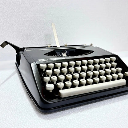 Hermes Baby Black Shadow portable English typewriter, vintage mechanical writing machine, RR Typewriter Mart online