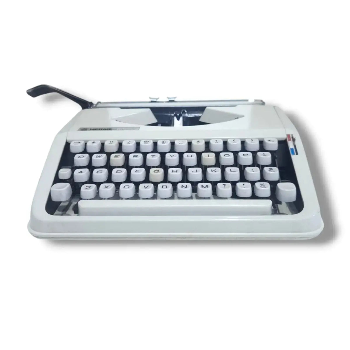 Low angle Hermes Typewriter typing machine, imported typewriter available at RR Typewriter Mart store
