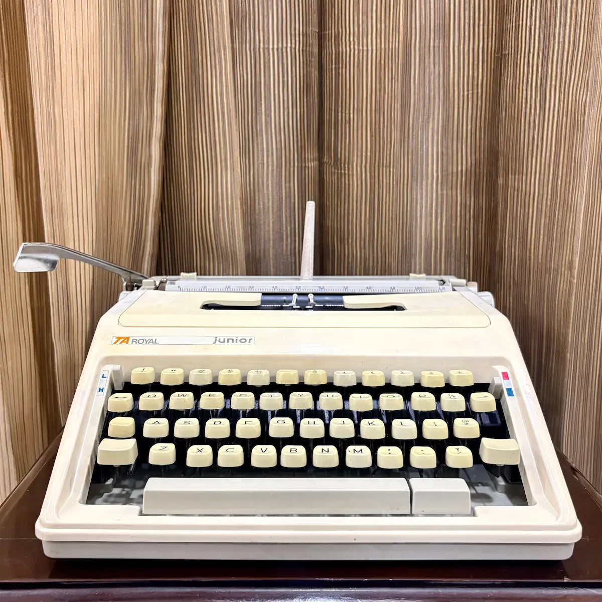 Royal Junior manual English typewriter with carriage, ribbon cover and cream keyboard, from RR Typewriter Mart.