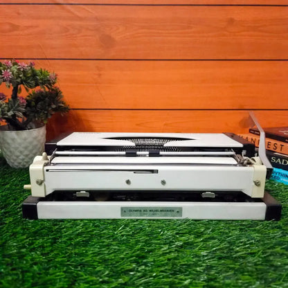 Brand New Olympia Traveller Deluxe Typewriter