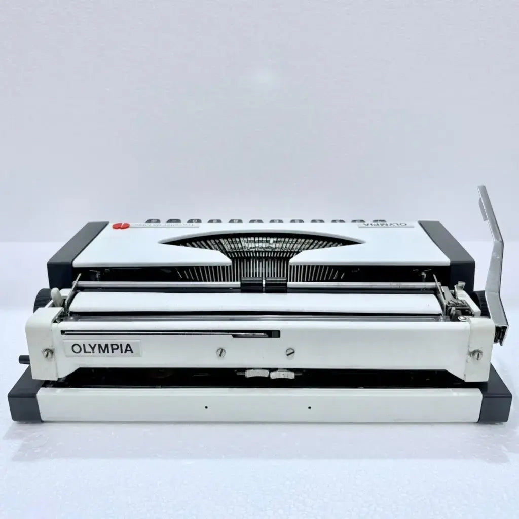 German Olympia Traveller de Luxe manual portable typewriter ready for typing