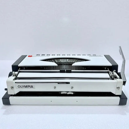 German Olympia Traveller de Luxe manual portable typewriter ready for typing