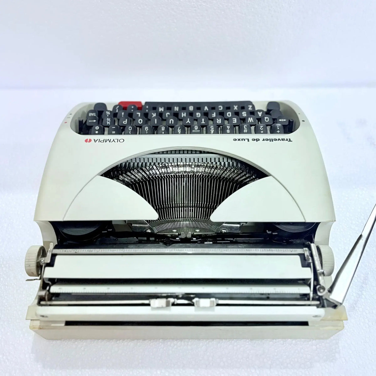 Olympia Traveller C English typewriter with clean black keys and red space bar, ready to buy from RR Typewriter Mart.