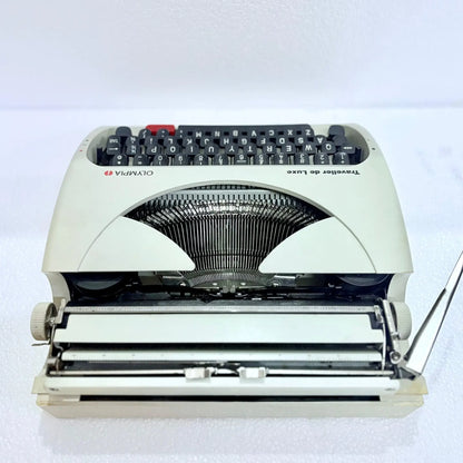 Olympia Traveller C English typewriter with clean black keys and red space bar, ready to buy from RR Typewriter Mart.